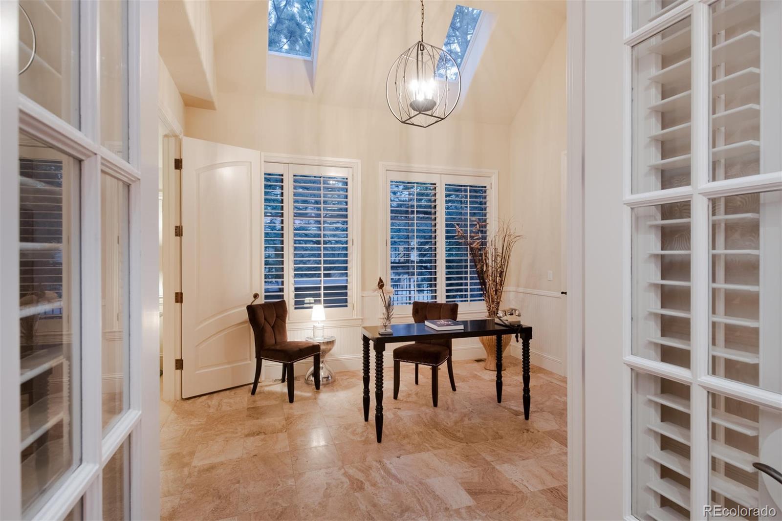 3 Sandy Lake Road Englewood, CO 80113 - Photo 10 of 35 a view of a livingroom with furniture and window