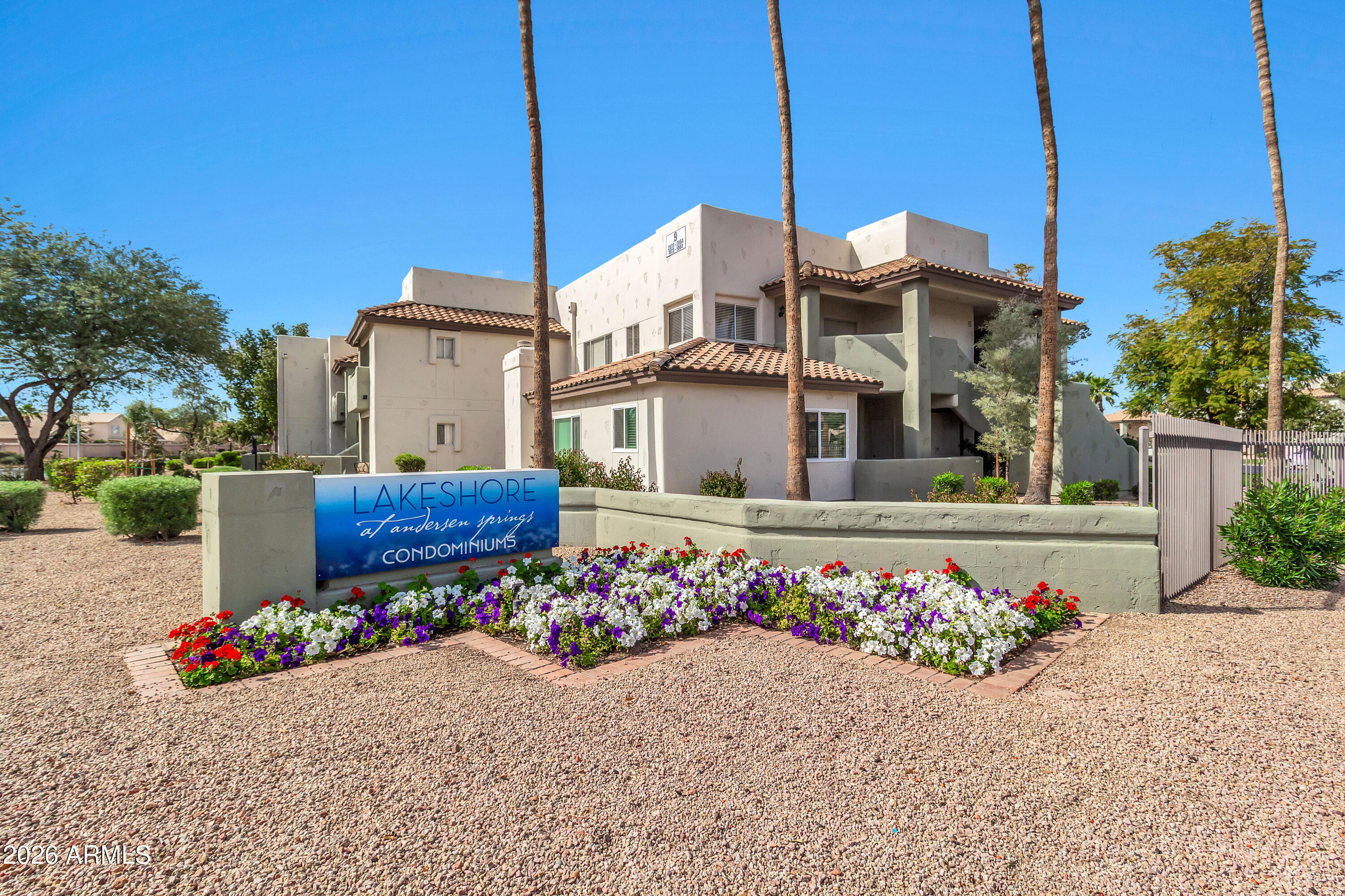 1825 West Ray Road, Unit 2072 Chandler, AZ 85224 - Photo 42 of 47 a front view of a house with a yard