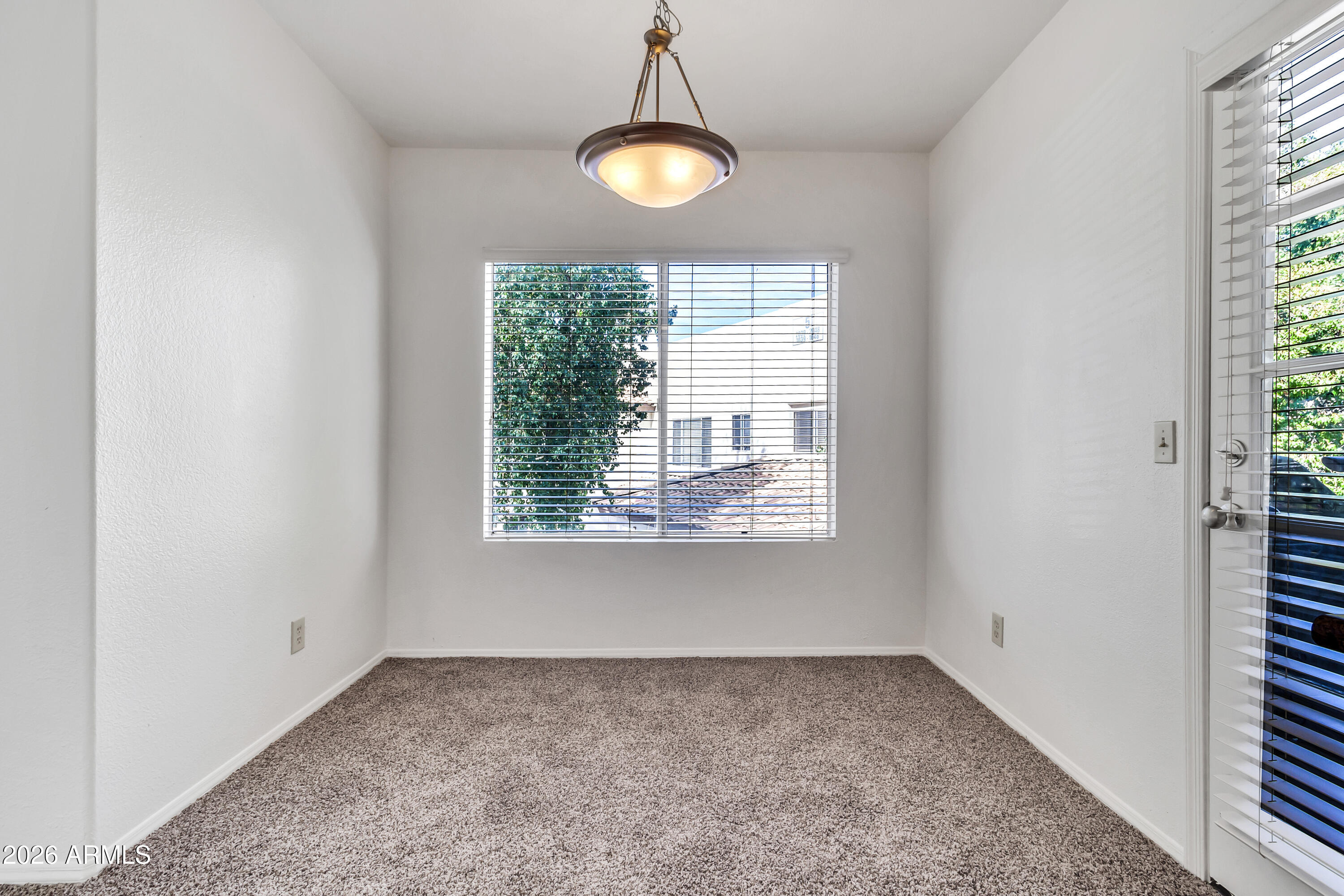 1825 West Ray Road, Unit 2072 Chandler, AZ 85224 - Photo 8 of 47 a view of a room that has a window in it