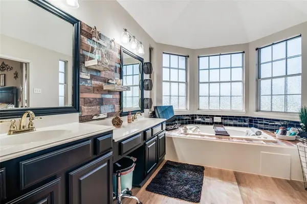 a room with a sink and a window