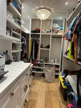 a bedroom with a bed and closet