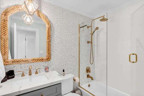 a bed room with a bed and a night stand