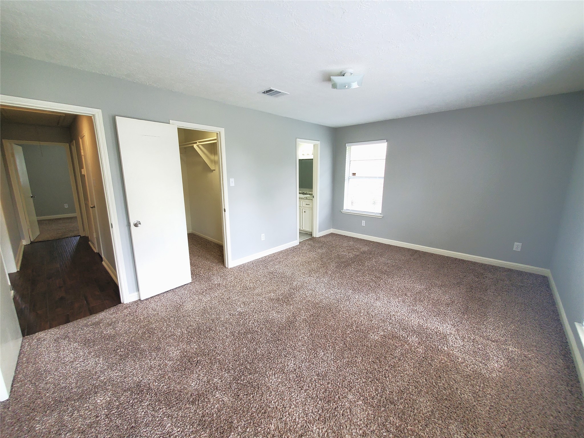 4507 Seneca Street Pasadena, TX 77504 - Photo 11 of 23 a view of a big room with windows and closet