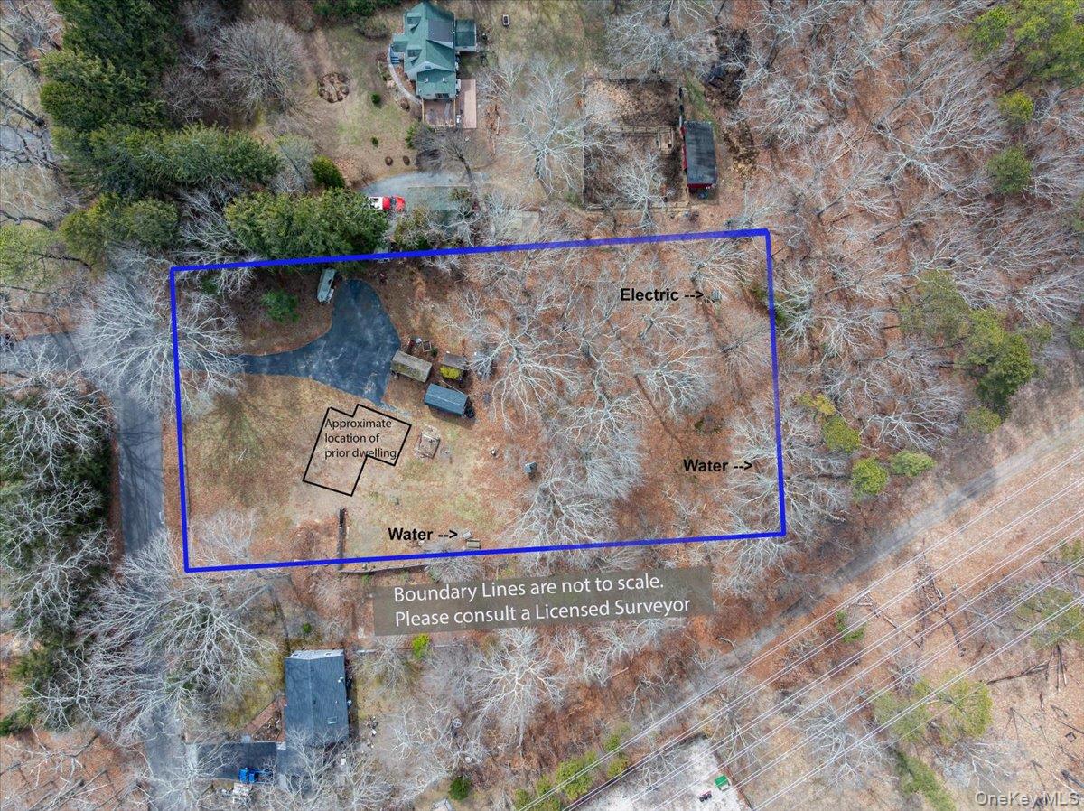 309 Primrose Path Manorville, NY 11949 - Photo 18 of 26 a view of water heater