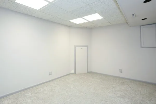 a view of front door of house with stairs