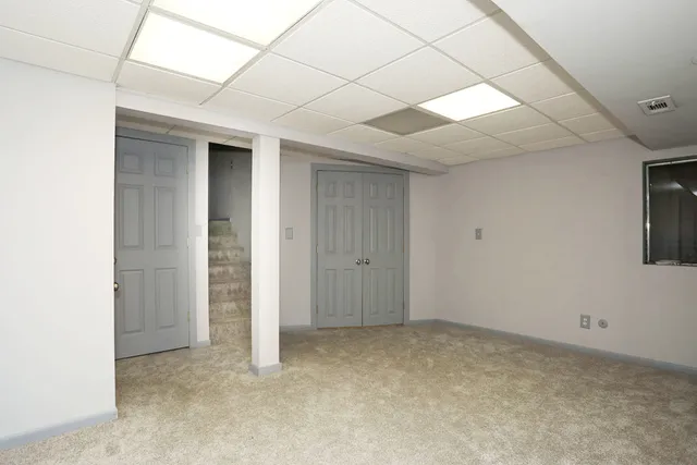 a view of a deck with furniture