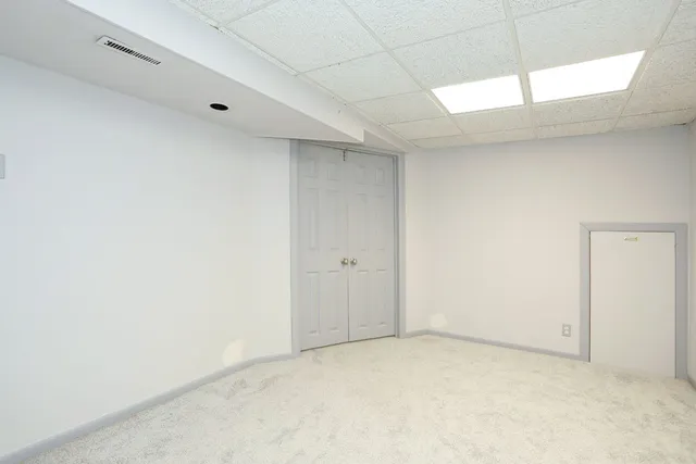 a view of a chairs and table in patio