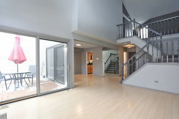 a view of staircase with white walls