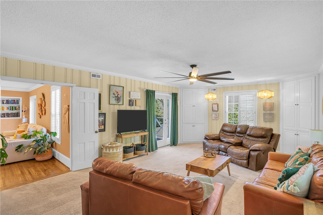 1107 Springdale Road Anderson, SC 29621 - Photo 11 of 49 This inviting family room offers comfort and ample space for gatherings.