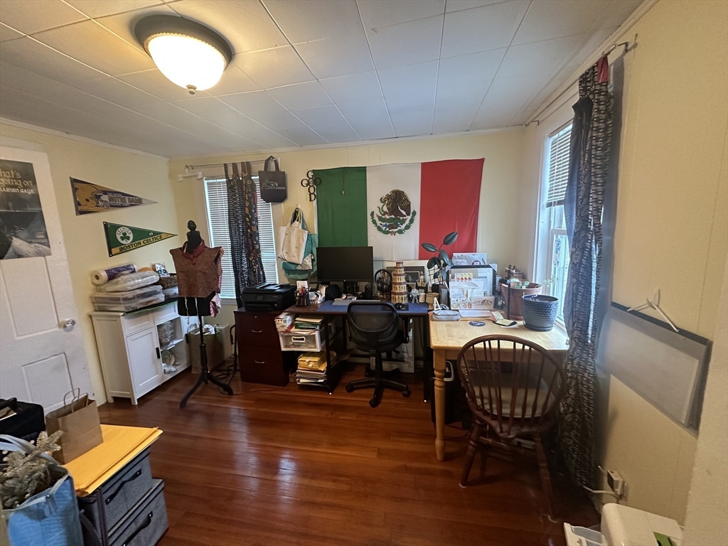 66 Summer Street, Unit 2 Natick, MA 01760 - Photo 14 of 20 a living room with furniture window and wooden floor