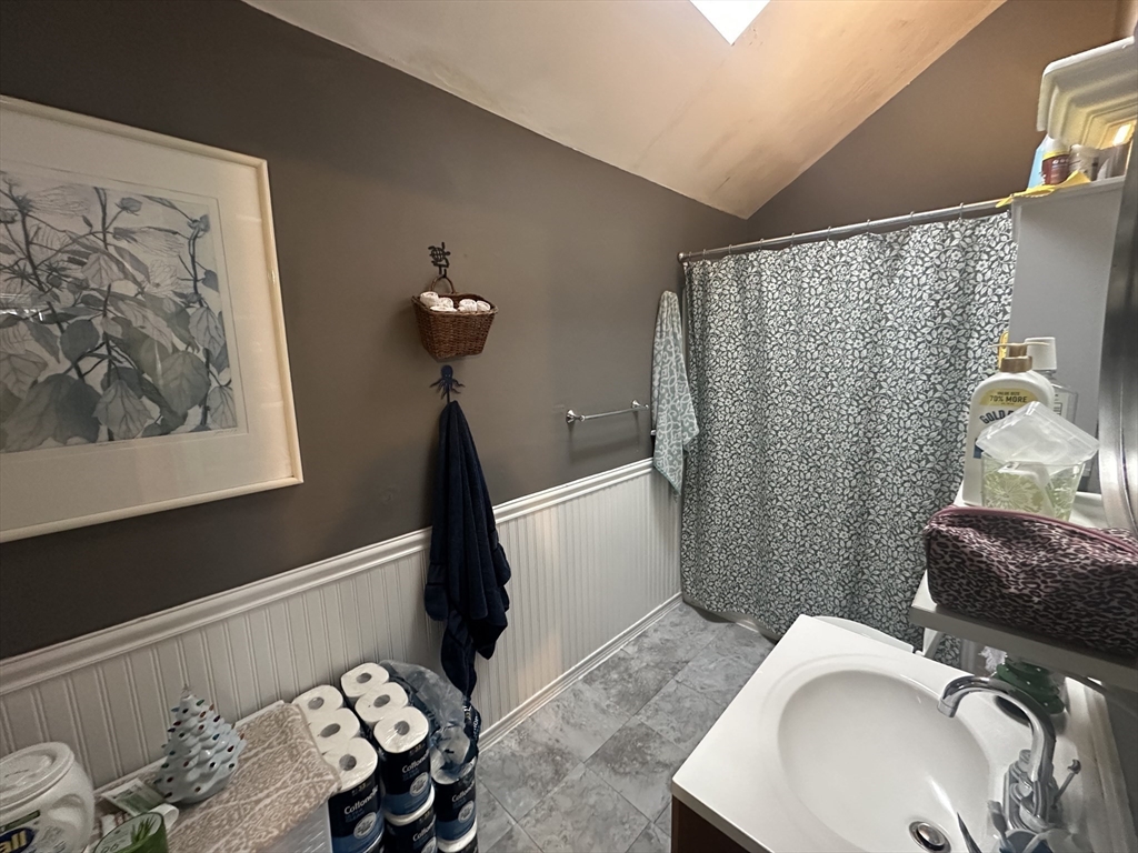 66 Summer Street, Unit 2 Natick, MA 01760 - Photo 16 of 20 a bathroom with a sink toilet and shower