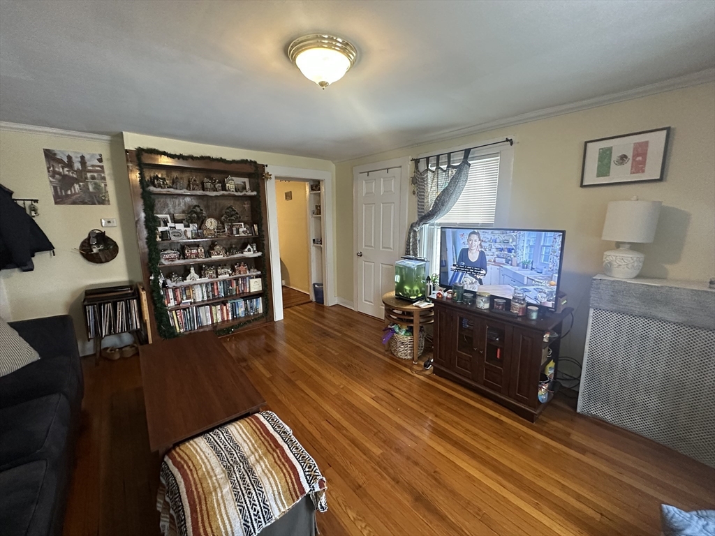 66 Summer Street, Unit 2 Natick, MA 01760 - Photo 5 of 20 a living room with furniture and wooden floor