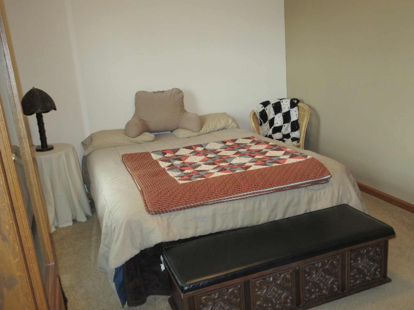 28081 Indian Point Road Sycamore, IL 60178 - Photo 17 of 24 a bedroom with a bed and dresser