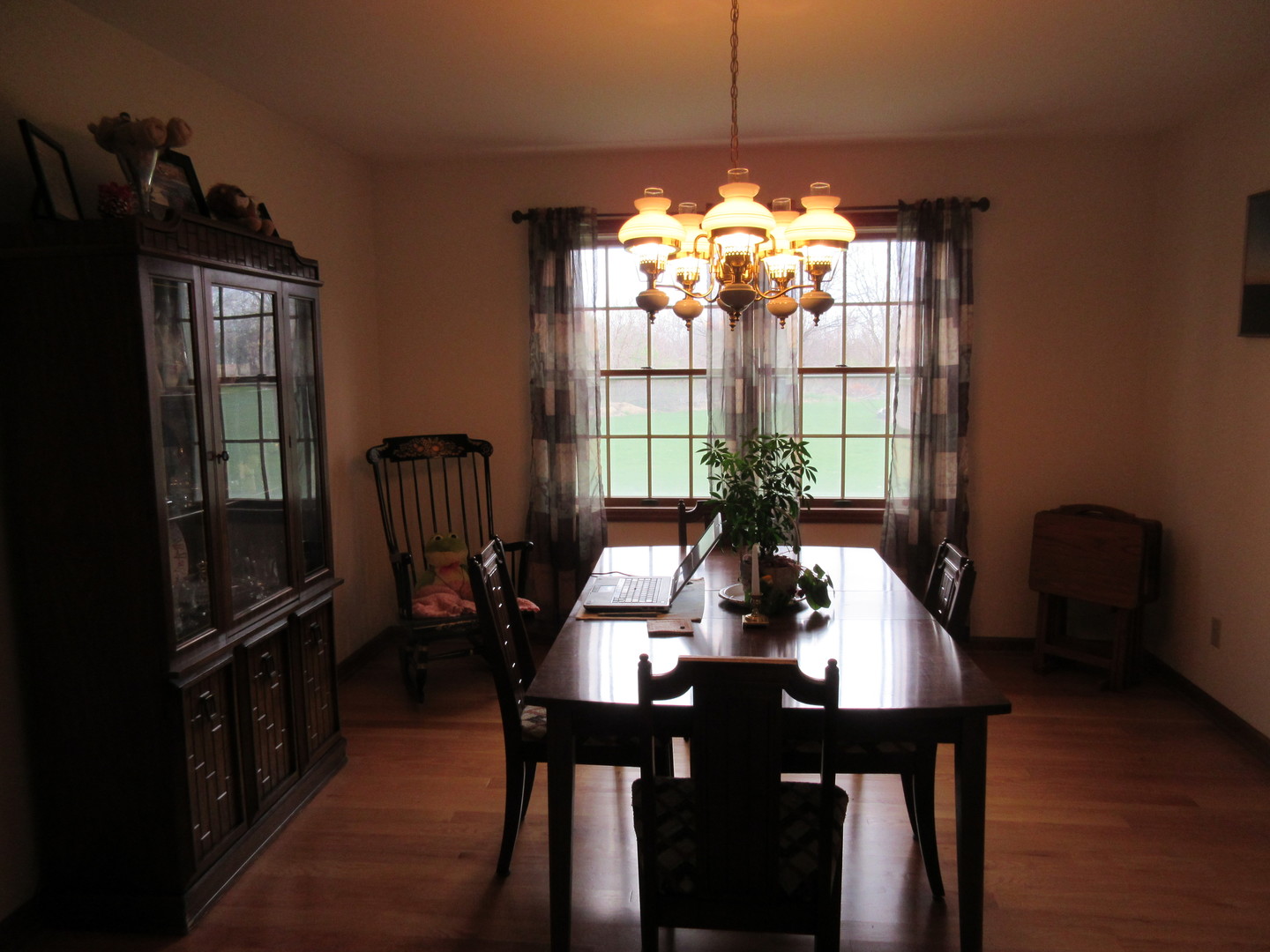 28081 Indian Point Road Sycamore, IL 60178 - Photo 5 of 24 a view of a dining room with furniture window and wooden floor