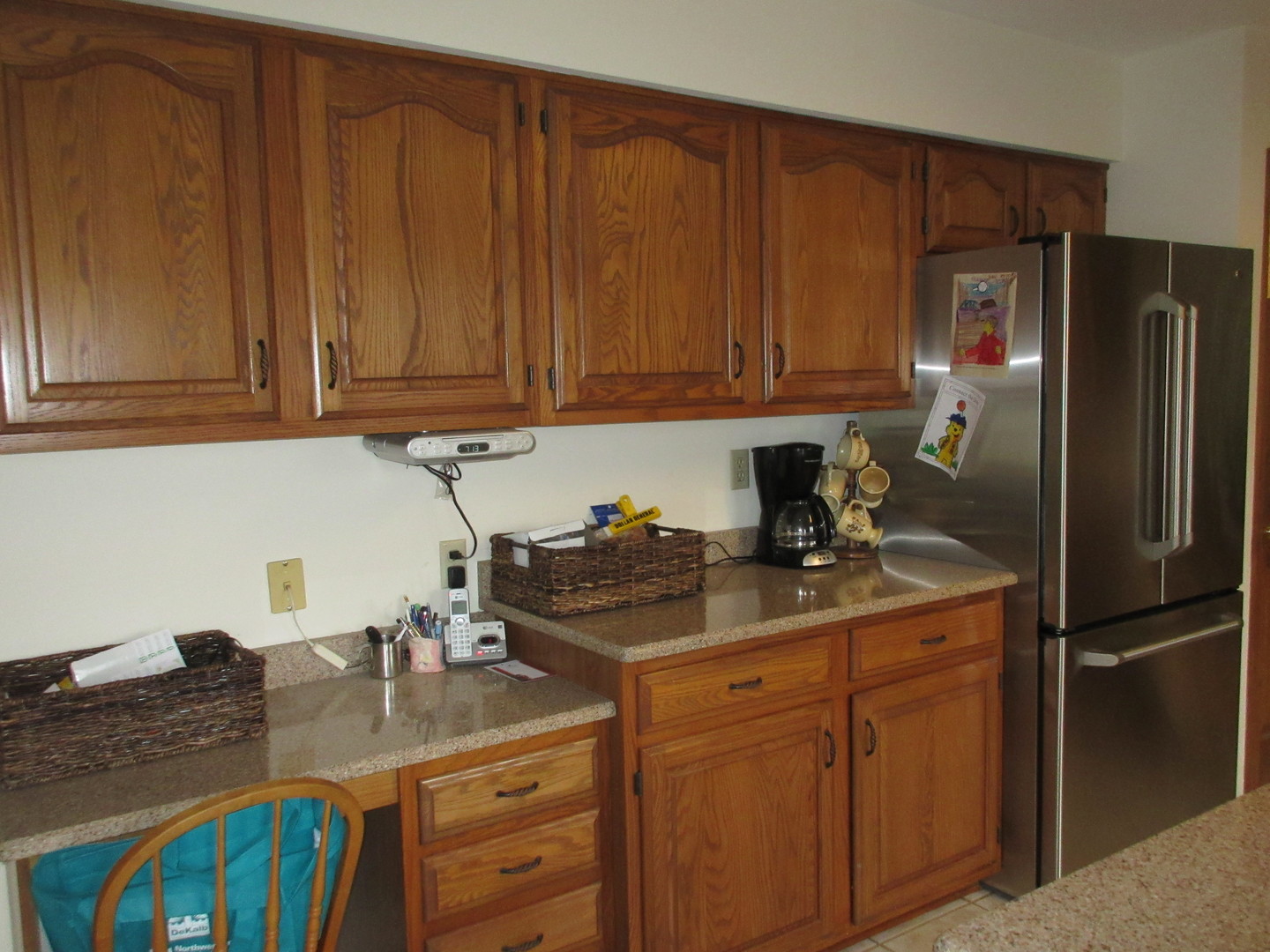 28081 Indian Point Road Sycamore, IL 60178 - Photo 8 of 24 a kitchen with stainless steel appliances granite countertop a sink stove and refrigerator