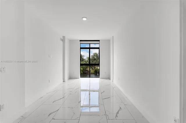 a view of an empty room with window