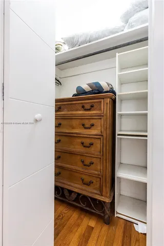 a bathroom with a toilet sink and shower
