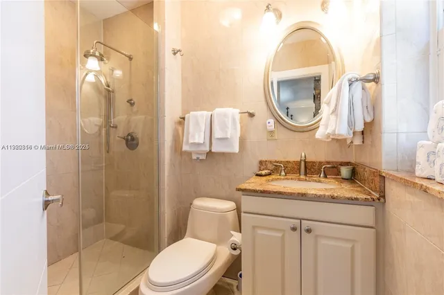 a bedroom with a bed and a table in it