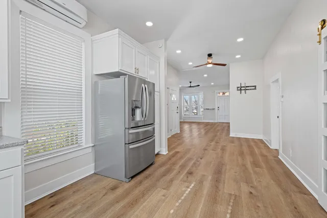 a view of kitchen with wooden floor