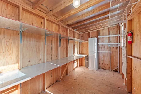 a view of entryway with wooden walls