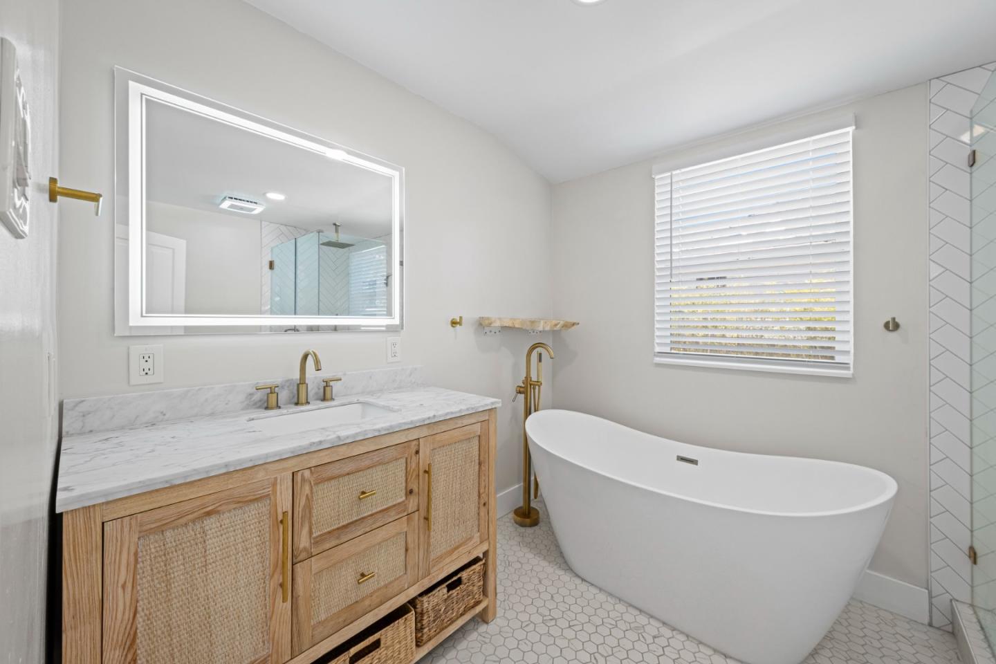 194 4th Street Gilroy, CA 95020 - Photo 3 of 20 a spacious bathroom with a granite countertop sink and a bathtub