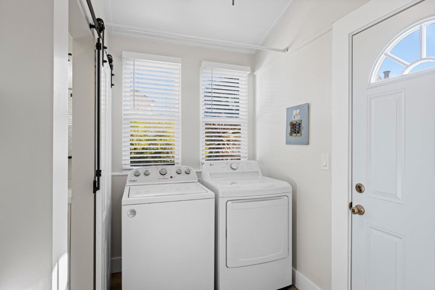 194 4th Street Gilroy, CA 95020 - Photo 9 of 20 a view of washer and dryer with bathroom in the background