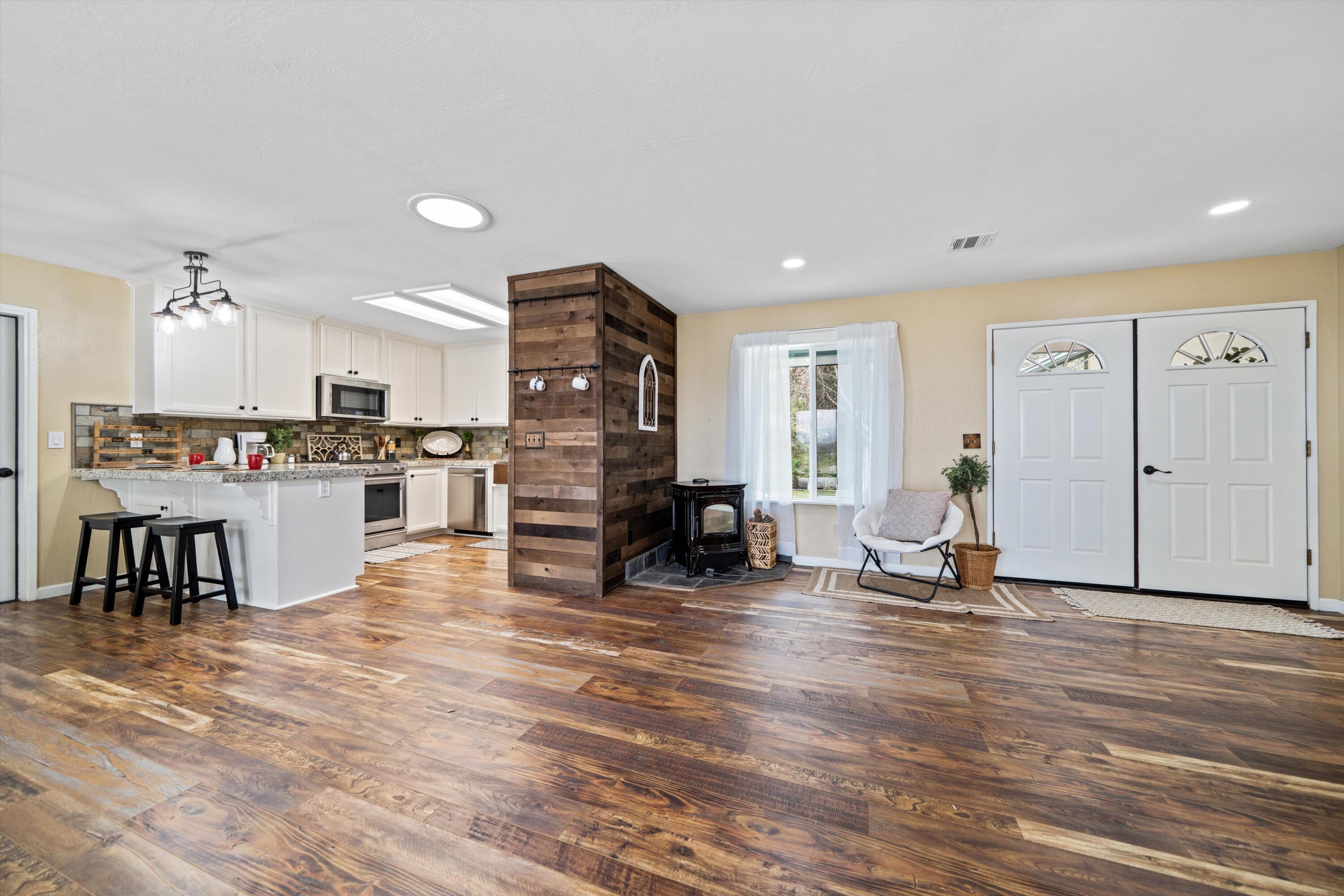 27900 Cummings Valley Road Tehachapi, CA 93561 - Photo 5 of 23 a view of kitchen with furniture and a refrigerator