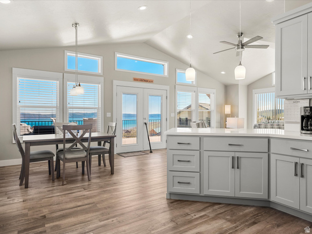 608 Fremont Road Fish Haven, ID 83287 - Photo 19 of 35 Open-concept living area with vaulted ceilings and wood-finish flooring