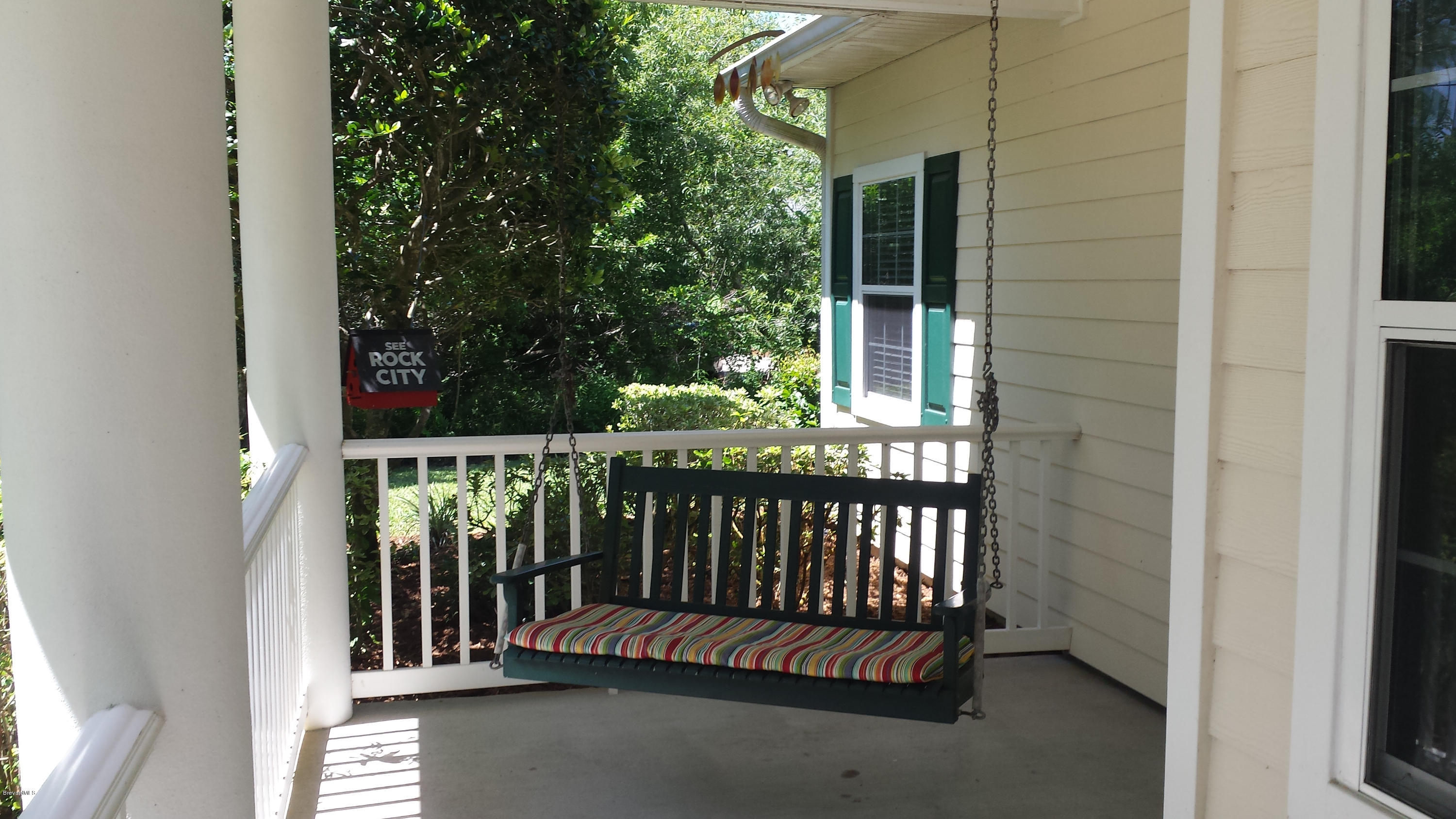 4243 Turtle Mound Road Melbourne, FL 32934 - Photo 5 of 25 Relax On The Front Porc