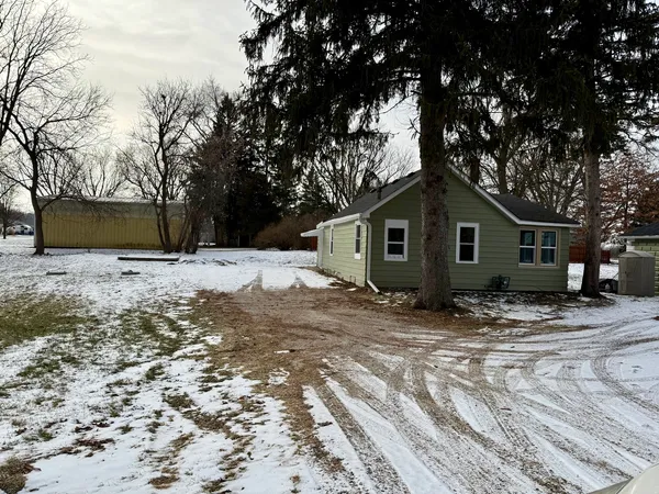a view of a house with snow