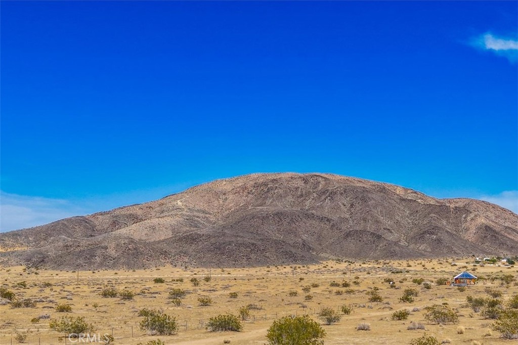 65944 Pipeline Road Twentynine Palms, CA 92277 - Photo 8 of 29 a view of ocean with a mountain in the background