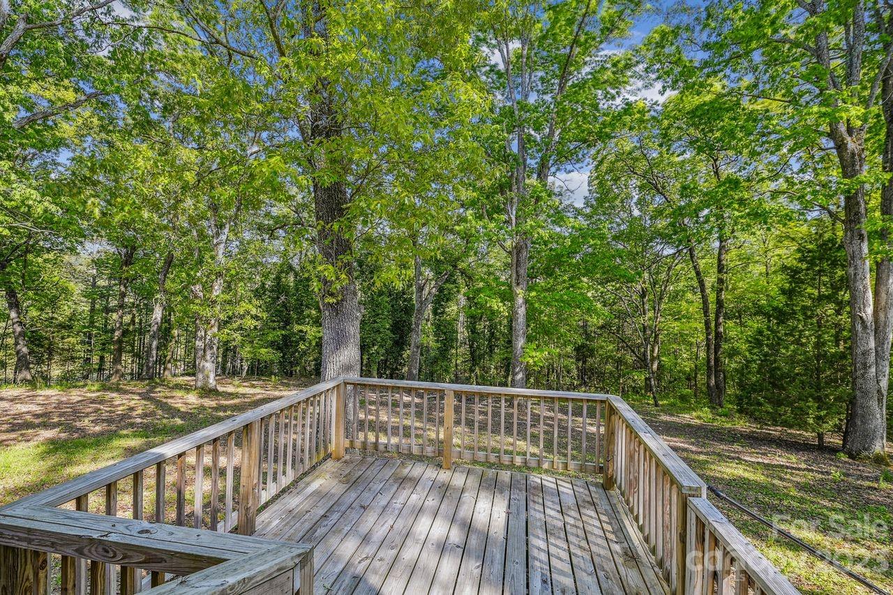 3710 Benjamin Street Richburg, SC 29729 - Photo 12 of 35 a view of balcony with wooden floor and fence
