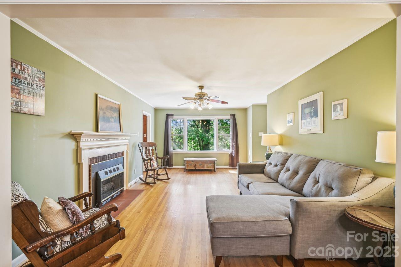 3710 Benjamin Street Richburg, SC 29729 - Photo 14 of 35 a living room with furniture fireplace and flat screen tv