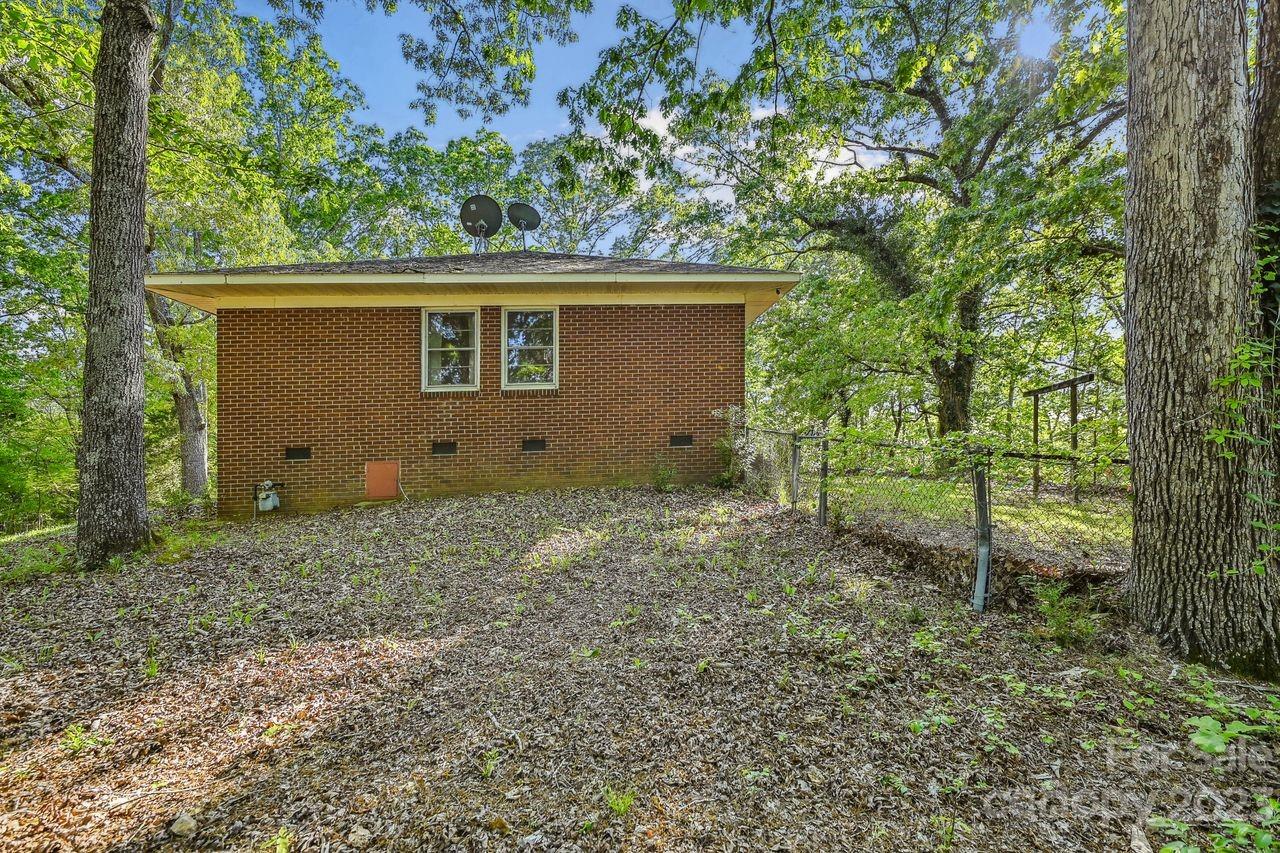 3710 Benjamin Street Richburg, SC 29729 - Photo 9 of 35 a view of a house with a backyard