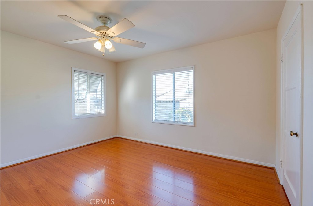 9816 Key W Street Temple City, CA 91780 - Photo 6 of 15 a view of an empty room with wooden floor and a window