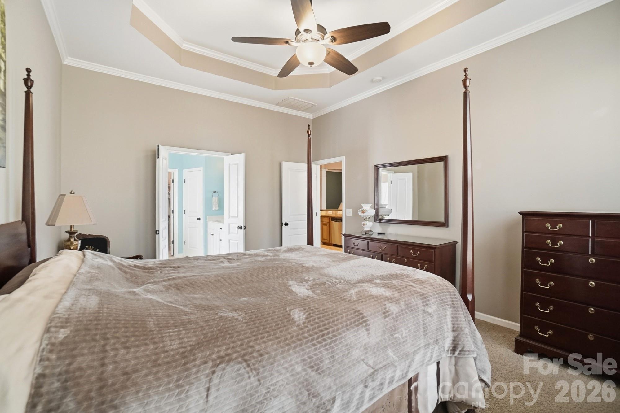 425 Silver Cypress Lane Fort Mill, SC 29708 - Photo 17 of 40 a bedroom with a bed and a dresser
