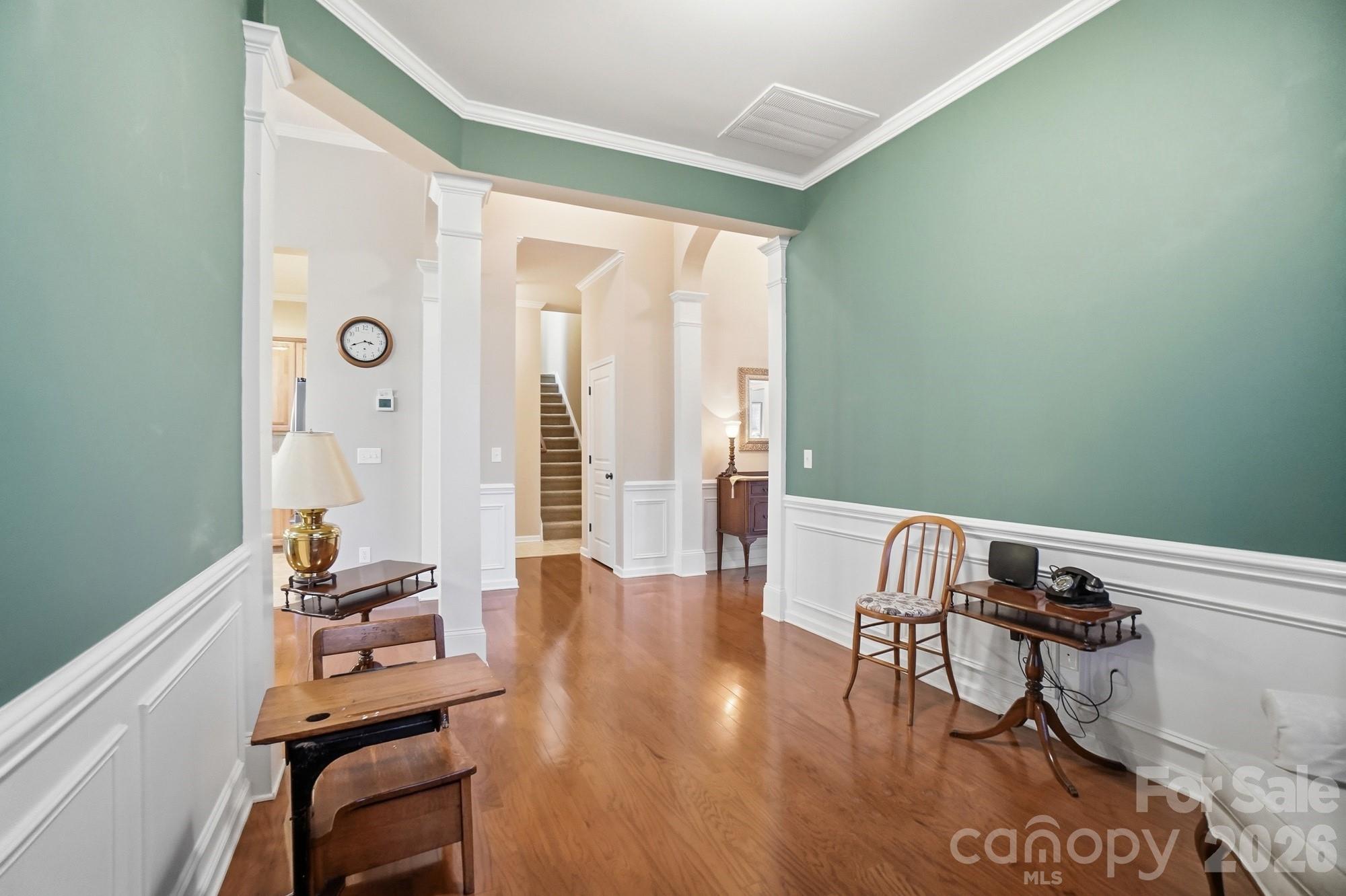 425 Silver Cypress Lane Fort Mill, SC 29708 - Photo 23 of 40 a view of a room with furniture and wooden floor