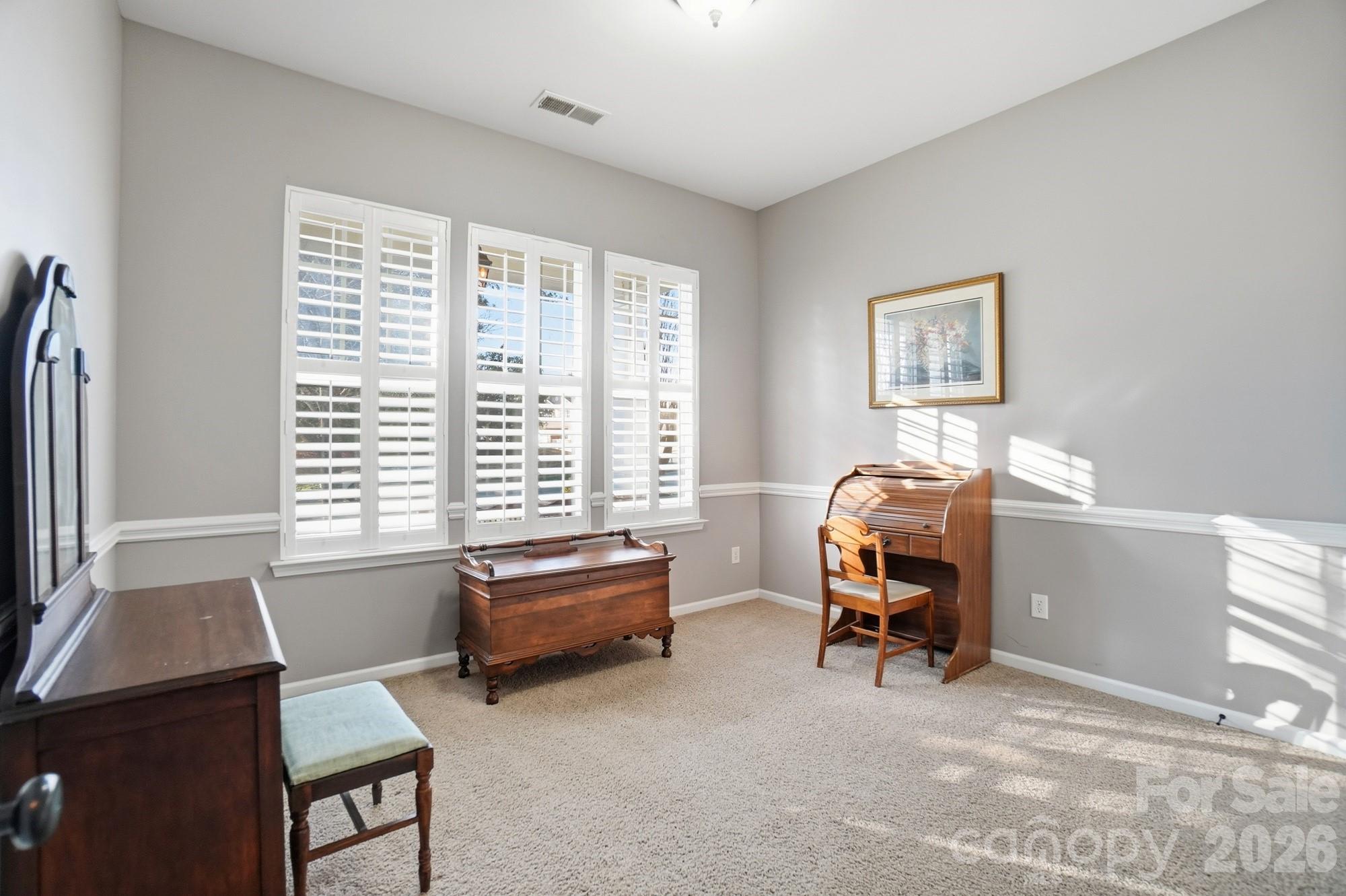 425 Silver Cypress Lane Fort Mill, SC 29708 - Photo 24 of 40 a view of a workspace with furniture and a window