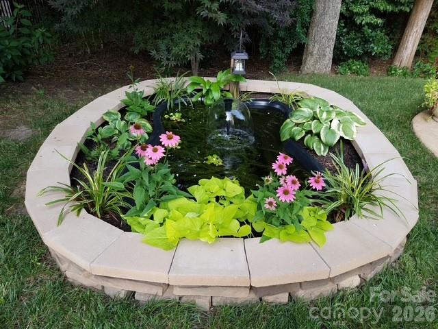 425 Silver Cypress Lane Fort Mill, SC 29708 - Photo 39 of 40 a white vase with flowers