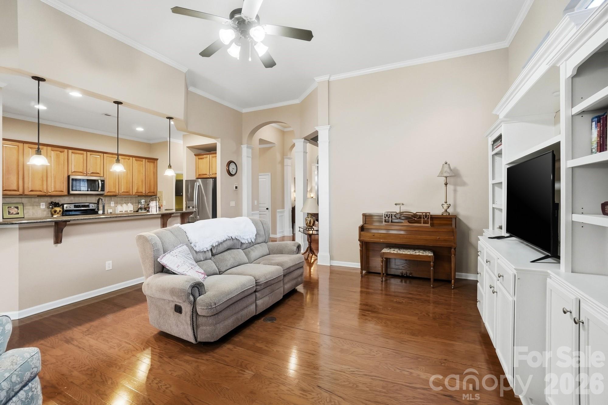 425 Silver Cypress Lane Fort Mill, SC 29708 - Photo 8 of 40 a living room with furniture and a flat screen tv