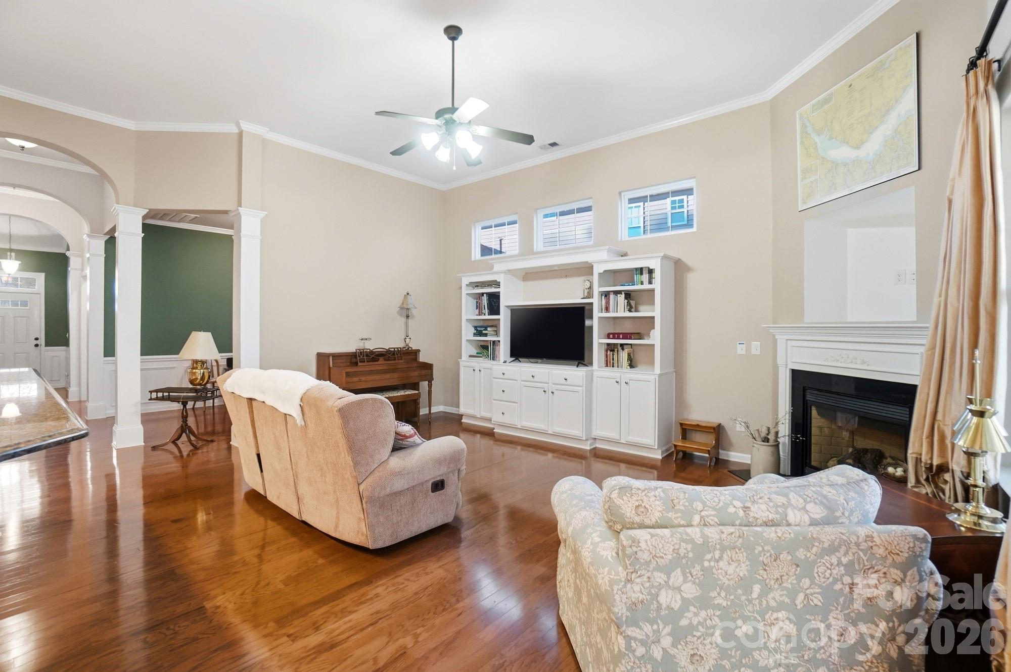 425 Silver Cypress Lane Fort Mill, SC 29708 - Photo 10 of 40 a living room with furniture and a fireplace
