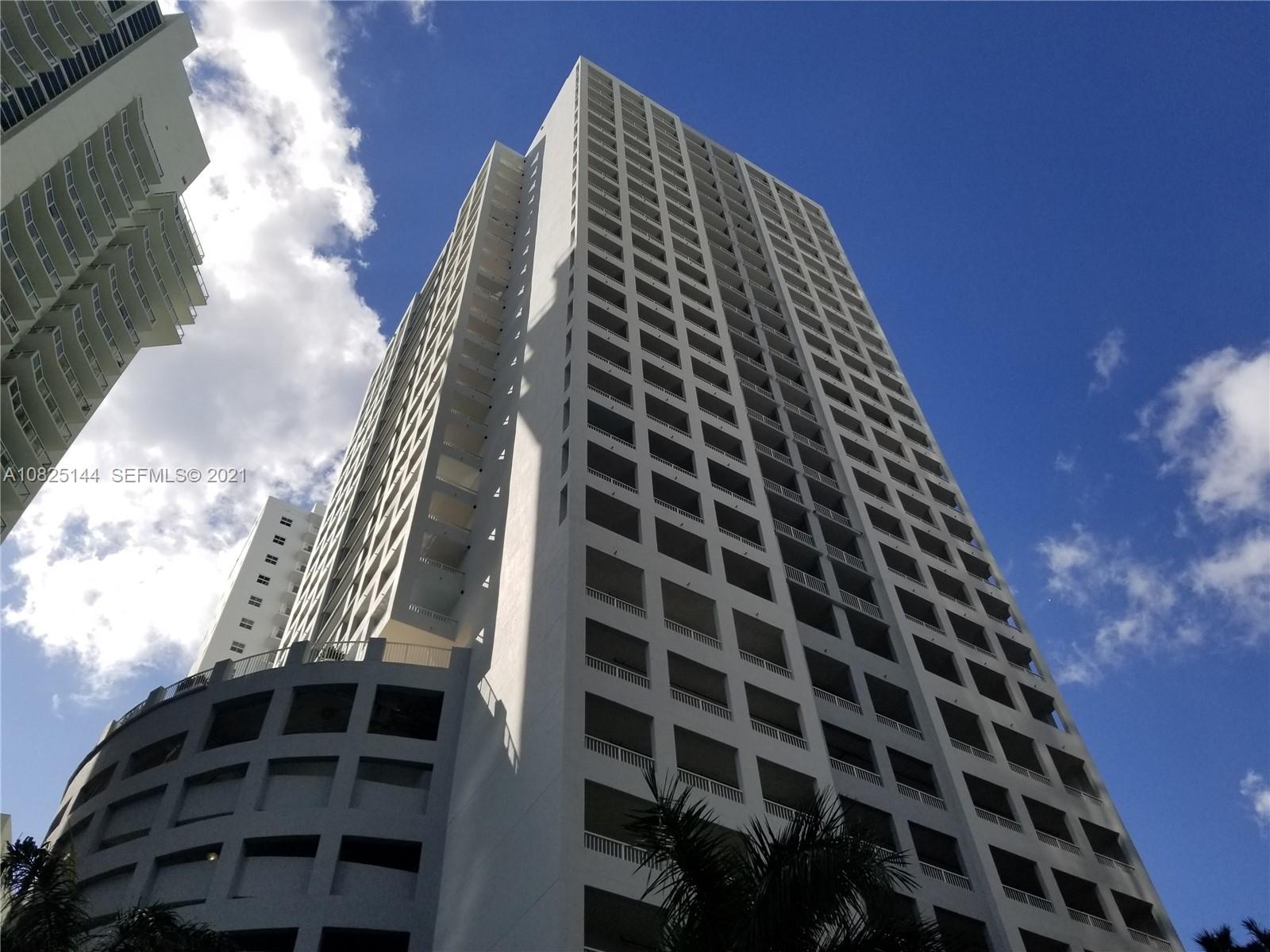 170 Southeast 14th Street, Unit 1507 Miami, FL 33131 - Photo 1 of 25 a view of a large building