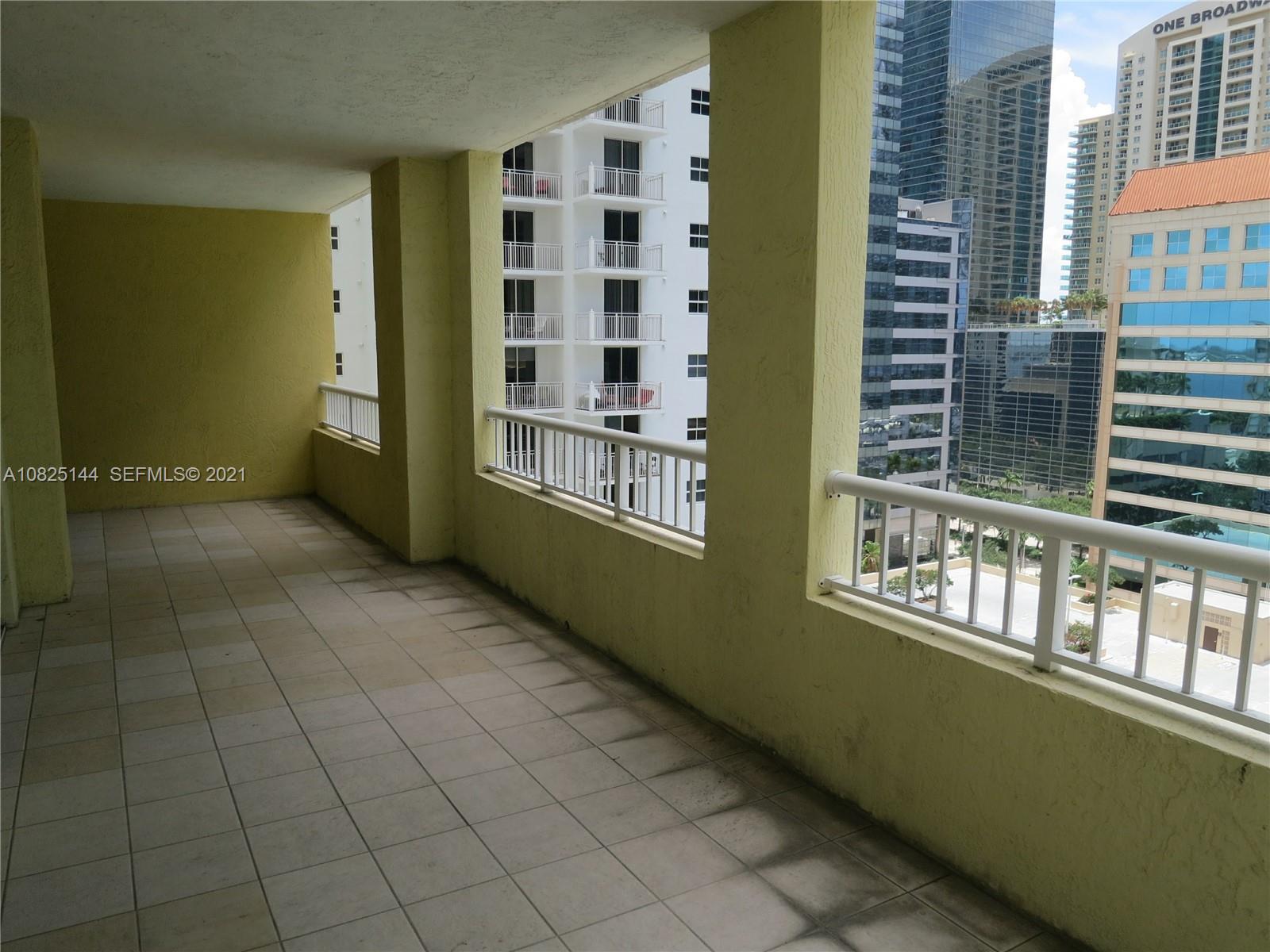 170 Southeast 14th Street, Unit 1507 Miami, FL 33131 - Photo 18 of 25 a view of a building from the balcony