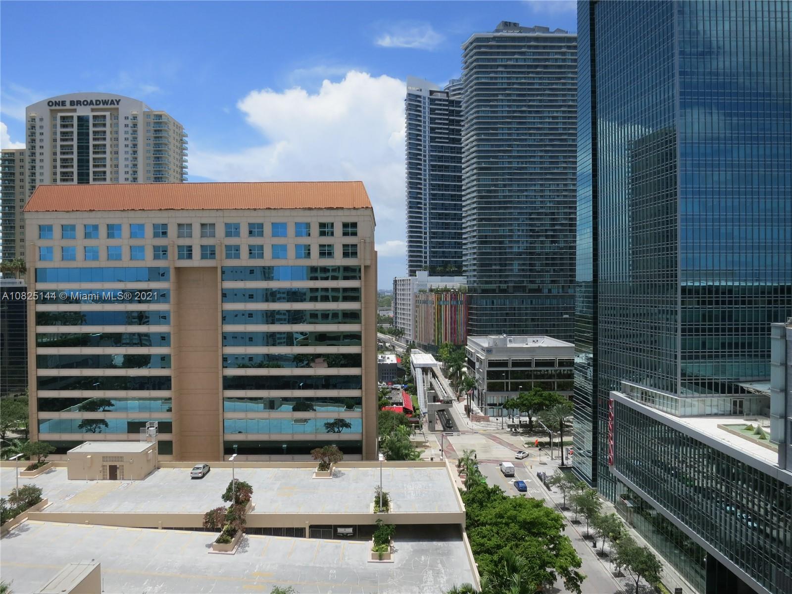 170 Southeast 14th Street, Unit 1507 Miami, FL 33131 - Photo 19 of 25 a front view of a building with a yard