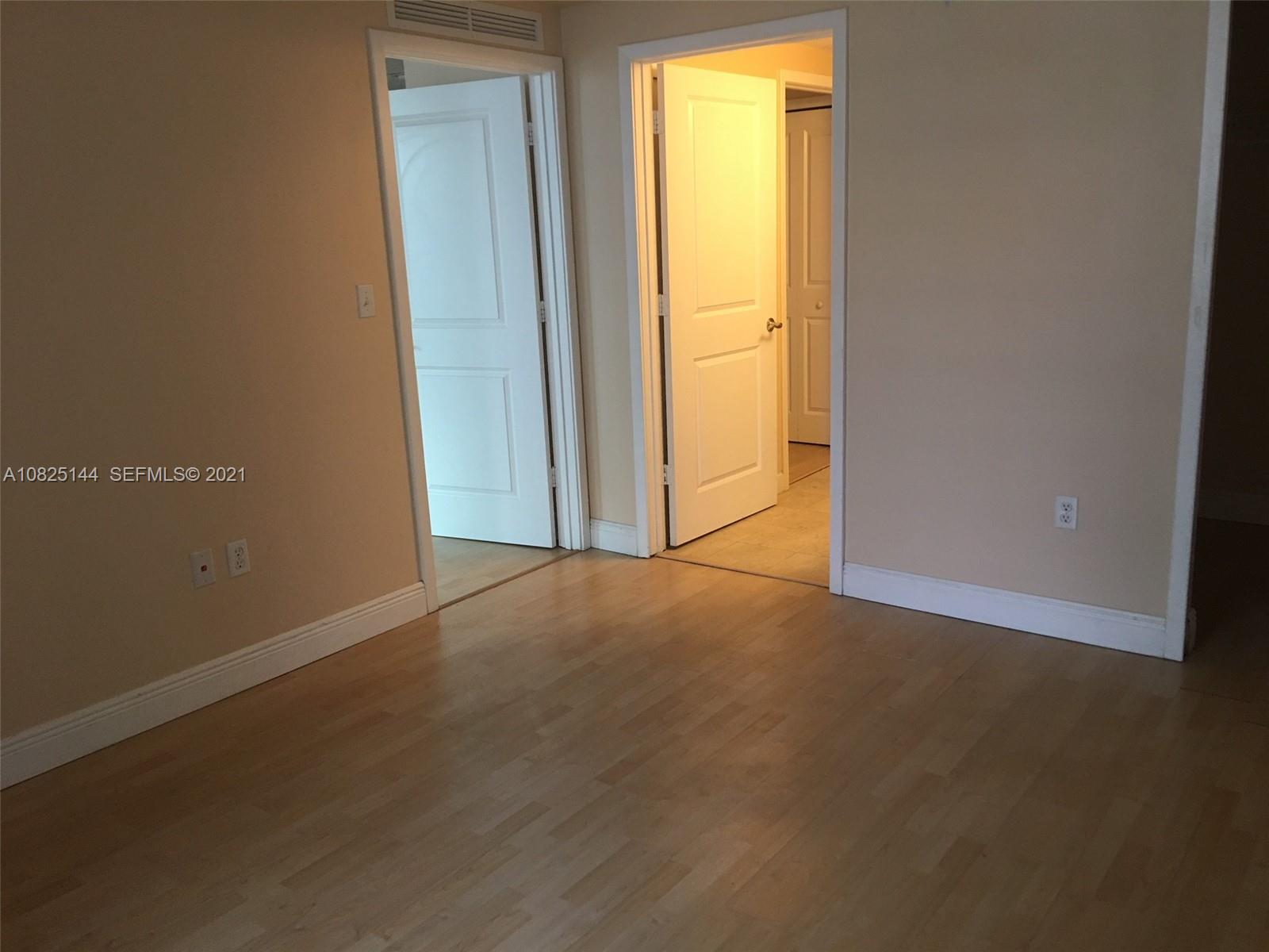 170 Southeast 14th Street, Unit 1507 Miami, FL 33131 - Photo 3 of 25 an empty room with window