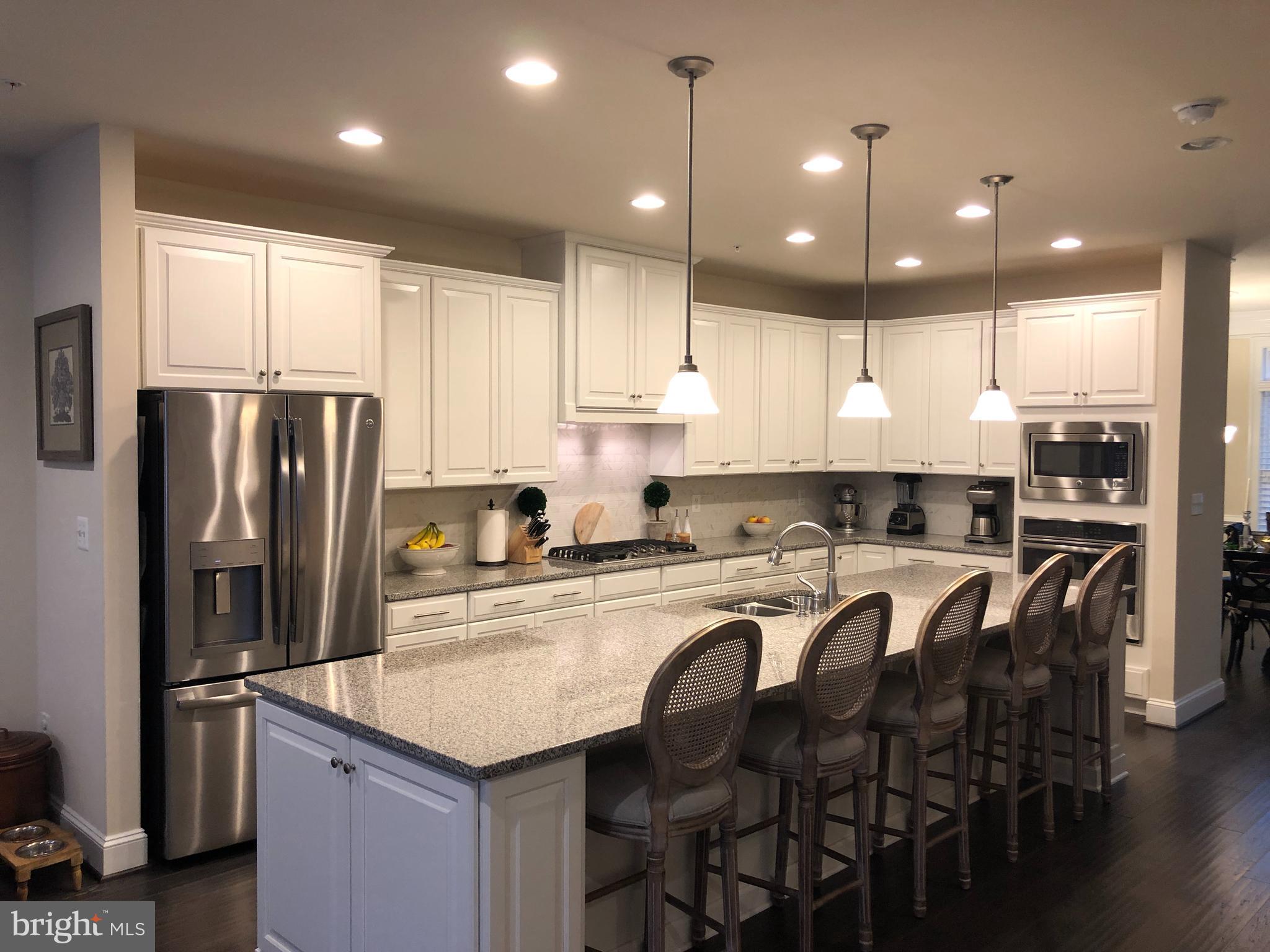 854 Stonecliffe Road Malvern, PA 19355 - Photo 7 of 19 13 foot island, stainless steel appliances