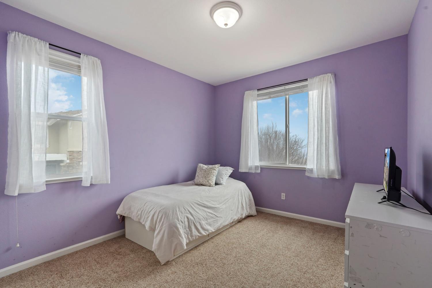 732 Pradera Way San Ramon, CA 94583 - Photo 21 of 45 a bedroom with a bed table and a window