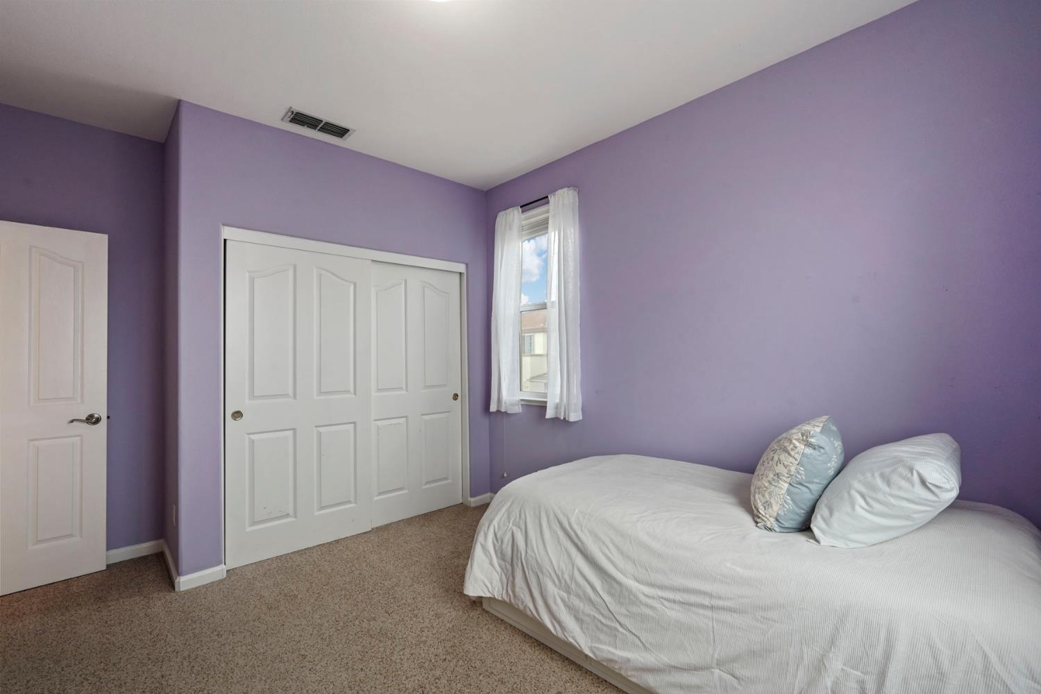 732 Pradera Way San Ramon, CA 94583 - Photo 22 of 45 a bedroom with a bed and a window