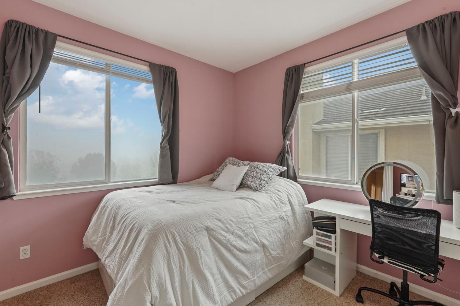 732 Pradera Way San Ramon, CA 94583 - Photo 26 of 45 a bedroom with a bed and a dresser next to a window