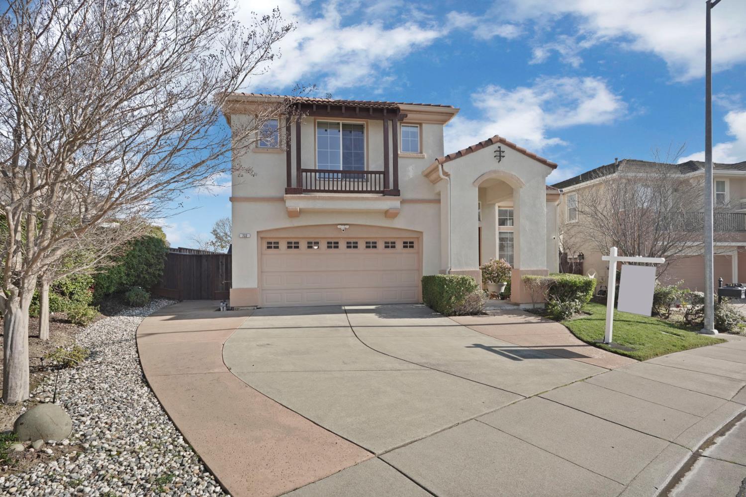 732 Pradera Way San Ramon, CA 94583 - Photo 3 of 45 a front view of a house with a yard and garage